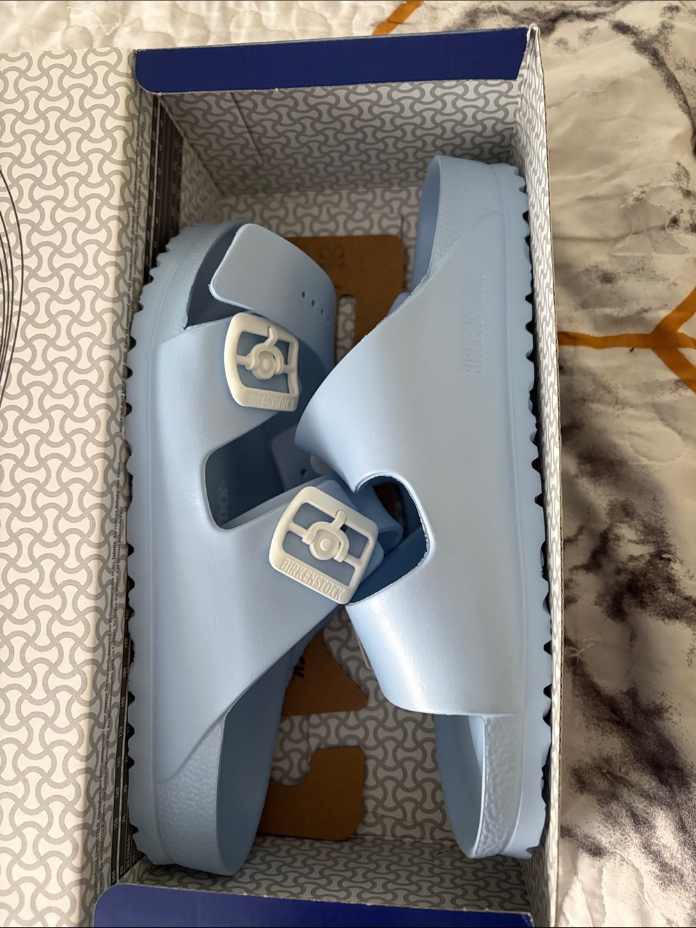 Birkenstock Women’s Light Blue EVA Arizona Sandals with White Buckles